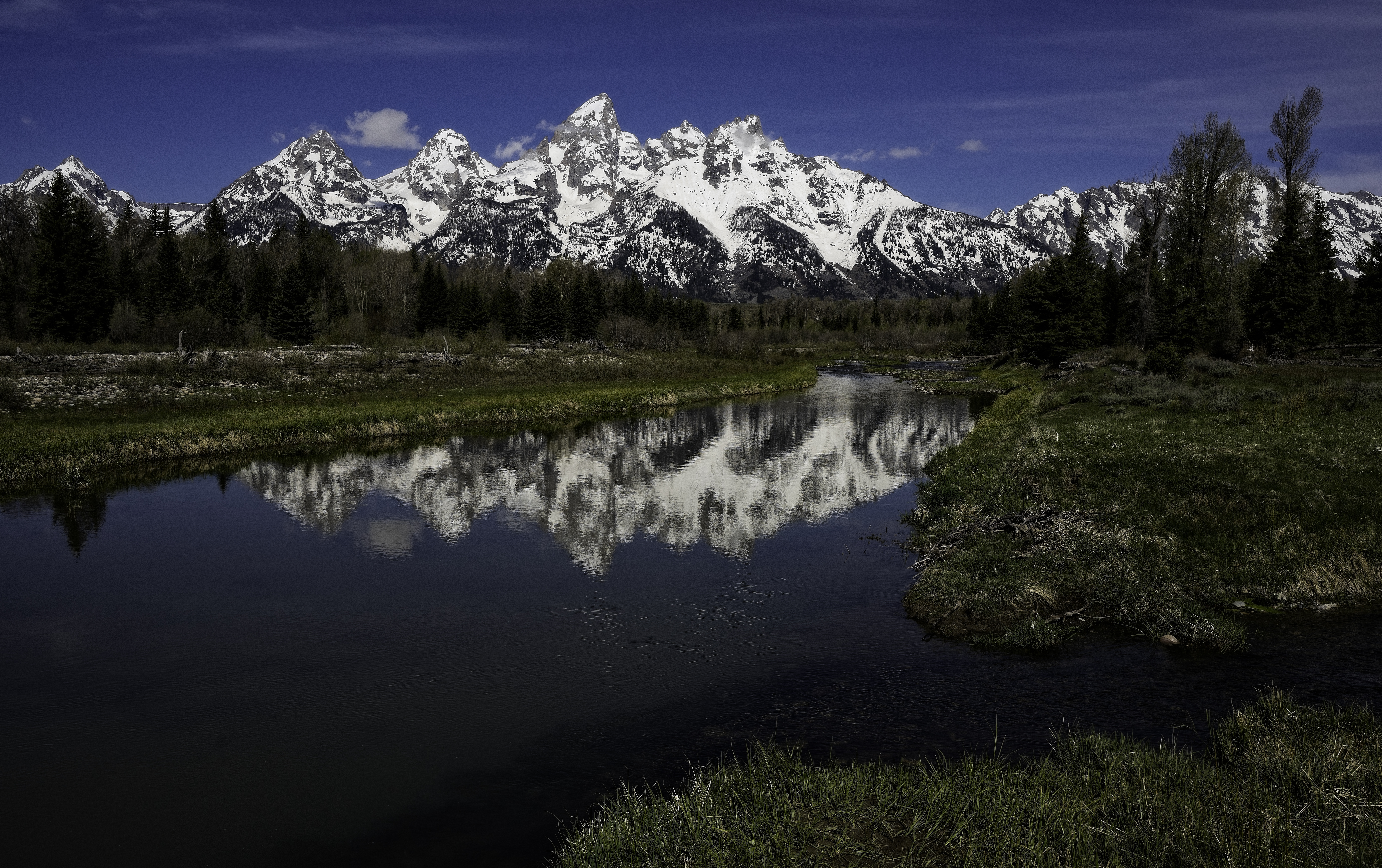 Reflected Teton mountain range in the Morning