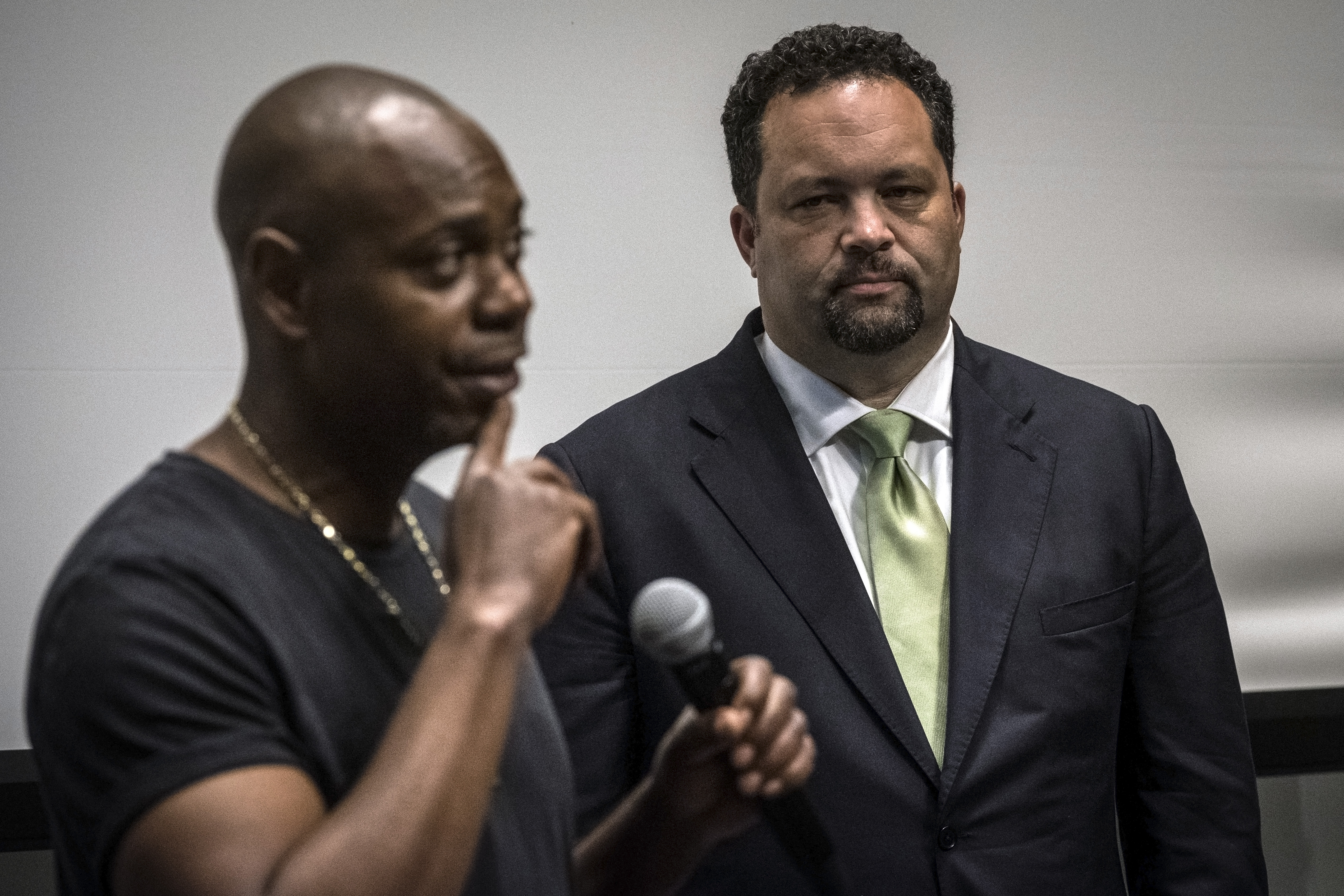 Comedian Dave Chappelle, left, stumps with childhood friend and former NAACP president Ben Jealous, right, at an early voting rally at Morgan State University in Baltimore, Maryland...