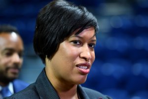 DC Mayor Bowser leads a tour at the Ward 8 Sports and Entertainment arena