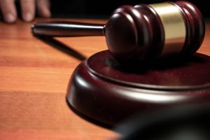 Close-Up Of Gavel On Table