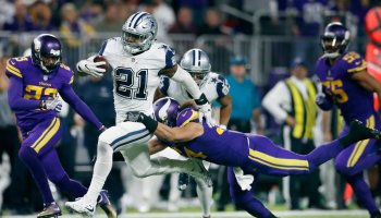 Dallas Cowboys running back Ezekiel Elliott (21) picked up a first down and was tackled by Minnesota Vikings middle linebacker Eric Kendricks (54) in the forth quarter at U.S. Bank Stadium Thursday December 01,2016 in Minneapolis MN. The Minnesota Viking