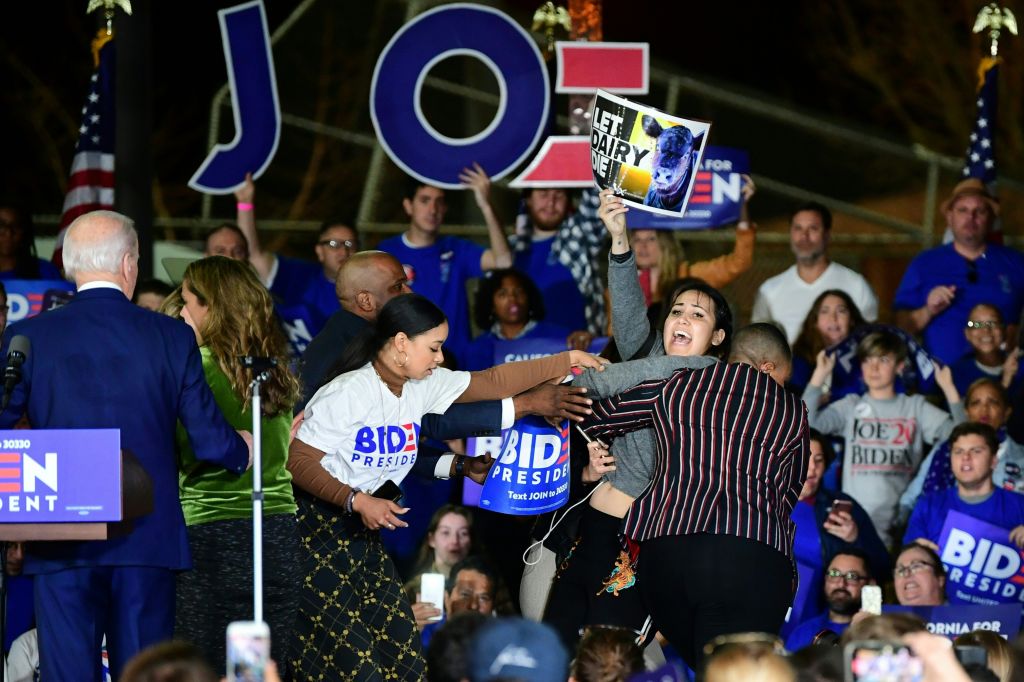 Symone Sanders Removes Anti-Dairy Protestor Off Stage At Joe Biden Rally