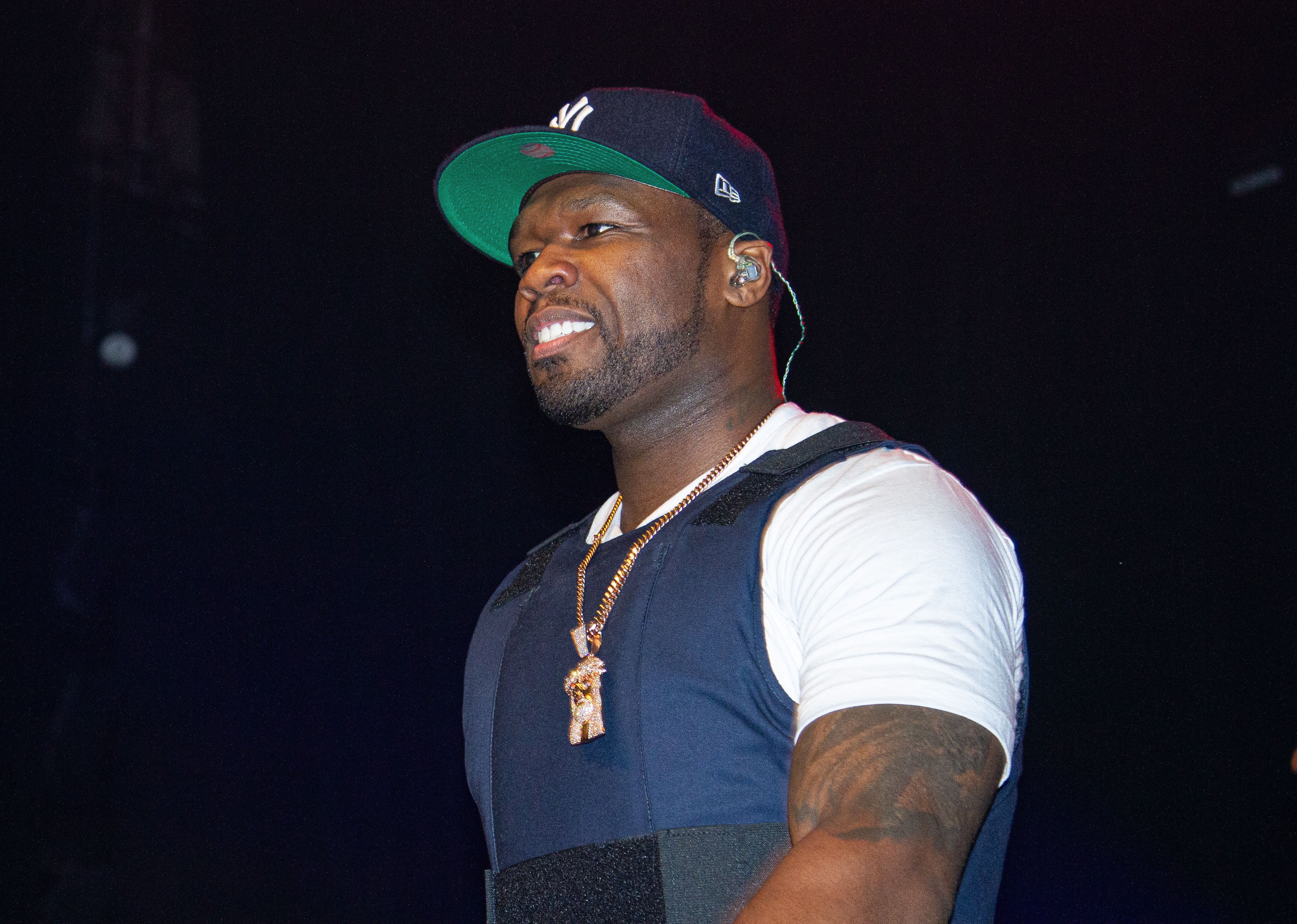 Artist Behind Hilarious Viral 50 Cent Murals Claims He Caught A Fade