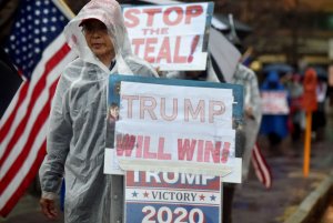 A protester holds a placard during the demonstration. A...