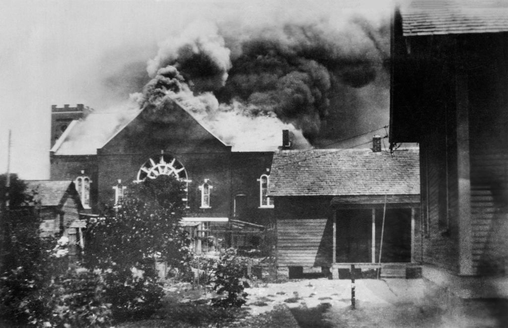 Burning of Church where Ammunition was stored during Race Riot, Tulsa, Oklahoma, USA, American National Red Cross Photograph Collection, June 1921