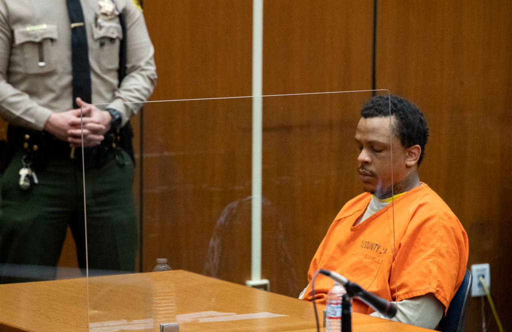 Eric Holder listens during sentencing proceeding