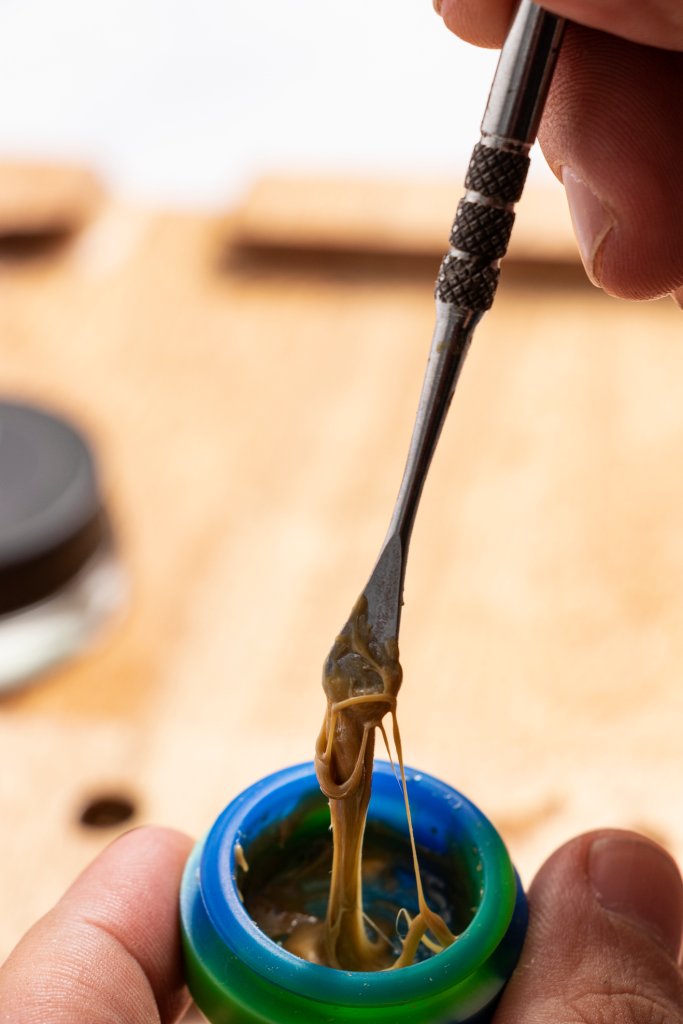 Airtight Latex Container Holding Hash Oil for Natural Medicine Production