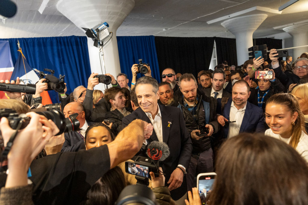 Andrew Cuomo greets supporters after a rally with members of...